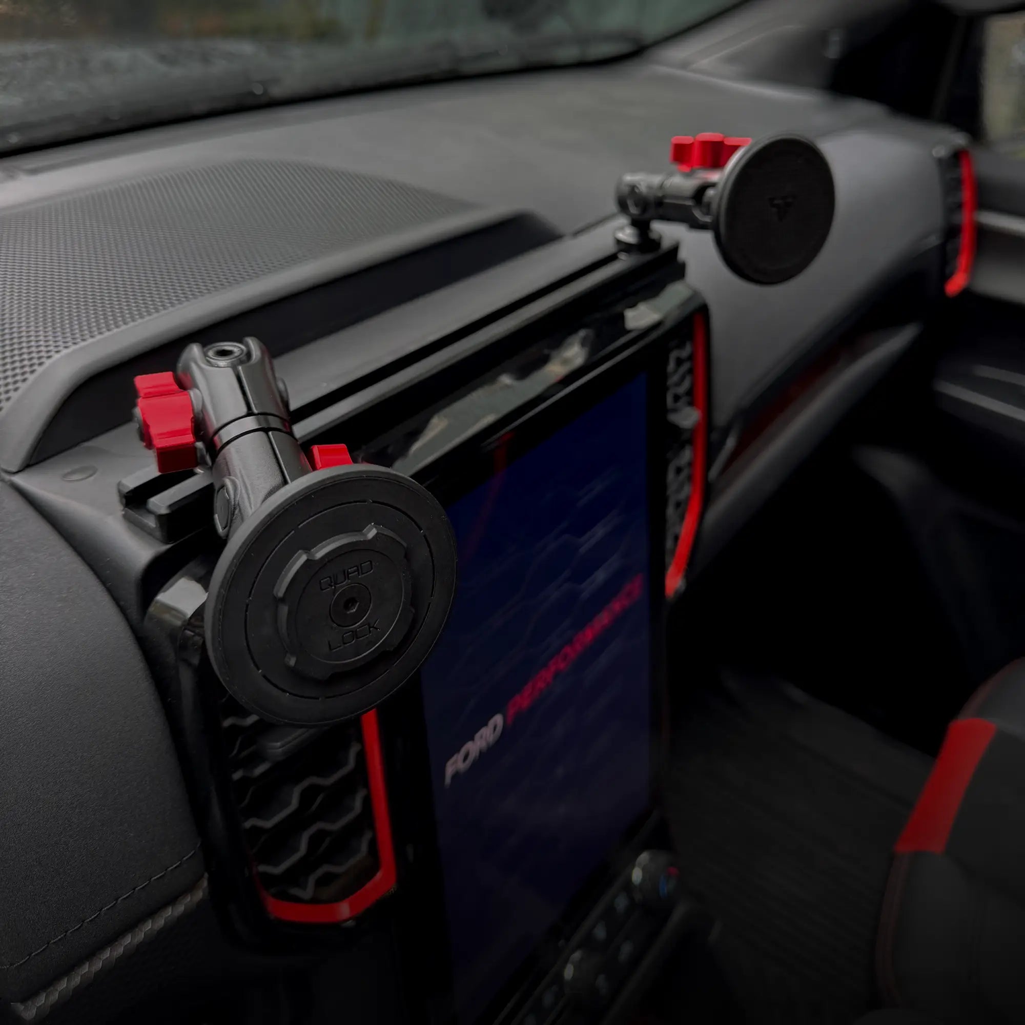 Tackform's 6th Gen Ford Ranger Phone Mount Lifestyle With QuadLock Holder and Tackform 'sMagSafe Holder with Red Billet Knobs