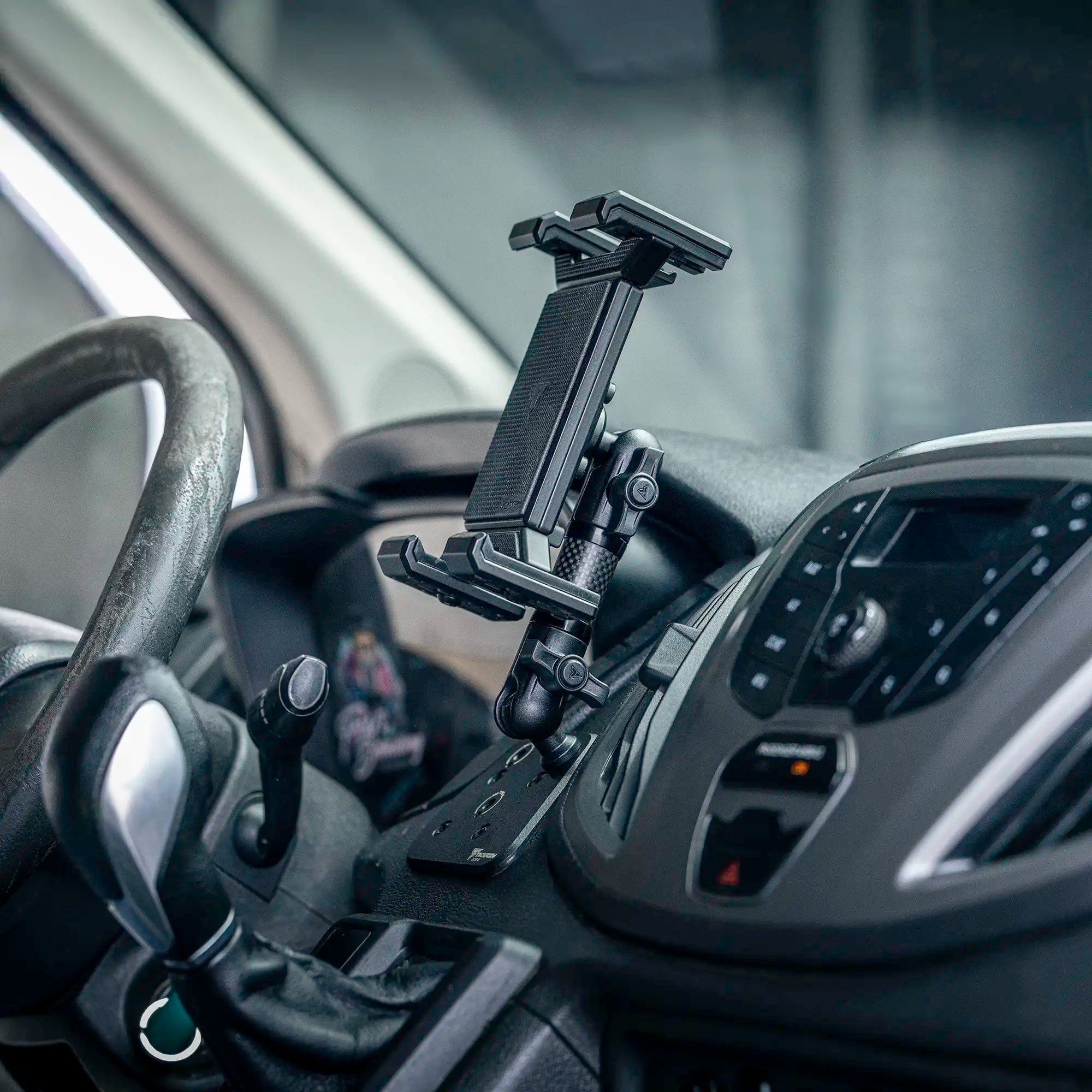 Lifestyle photo of Ford Transit All-Metal Tablet with carbon fiber arm