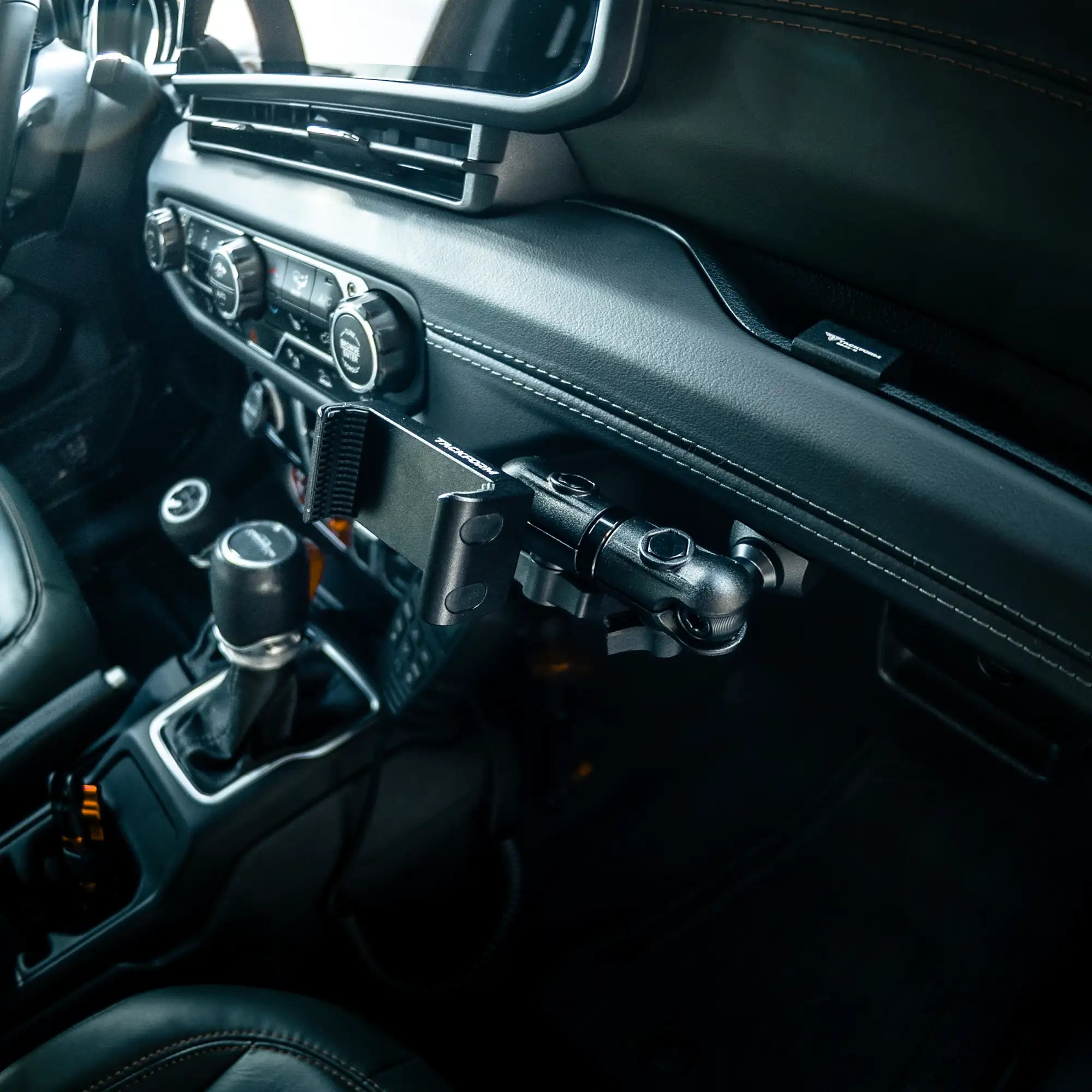 Lifestyle image of 2024+ Jeep Phone Mount with Billet Spring-Cradle for Passenger Side Grab Bar
