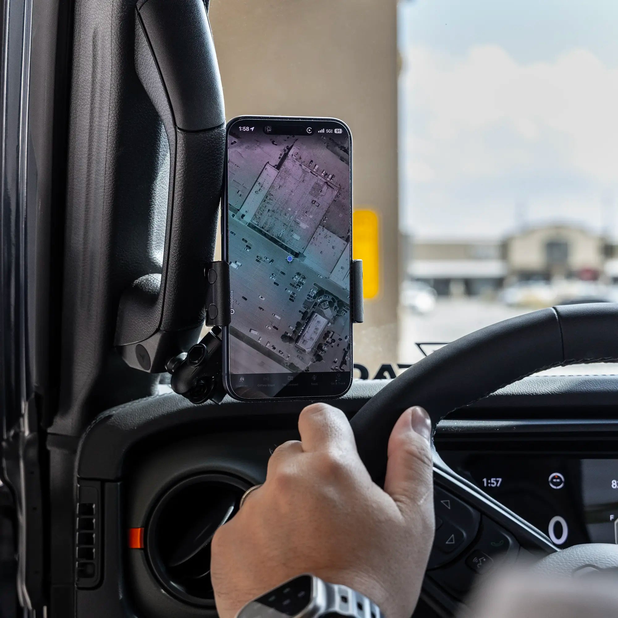 Lifestyle image of 2024+ Jeep JL, JT, 4xe Grab Handle Phone Mount