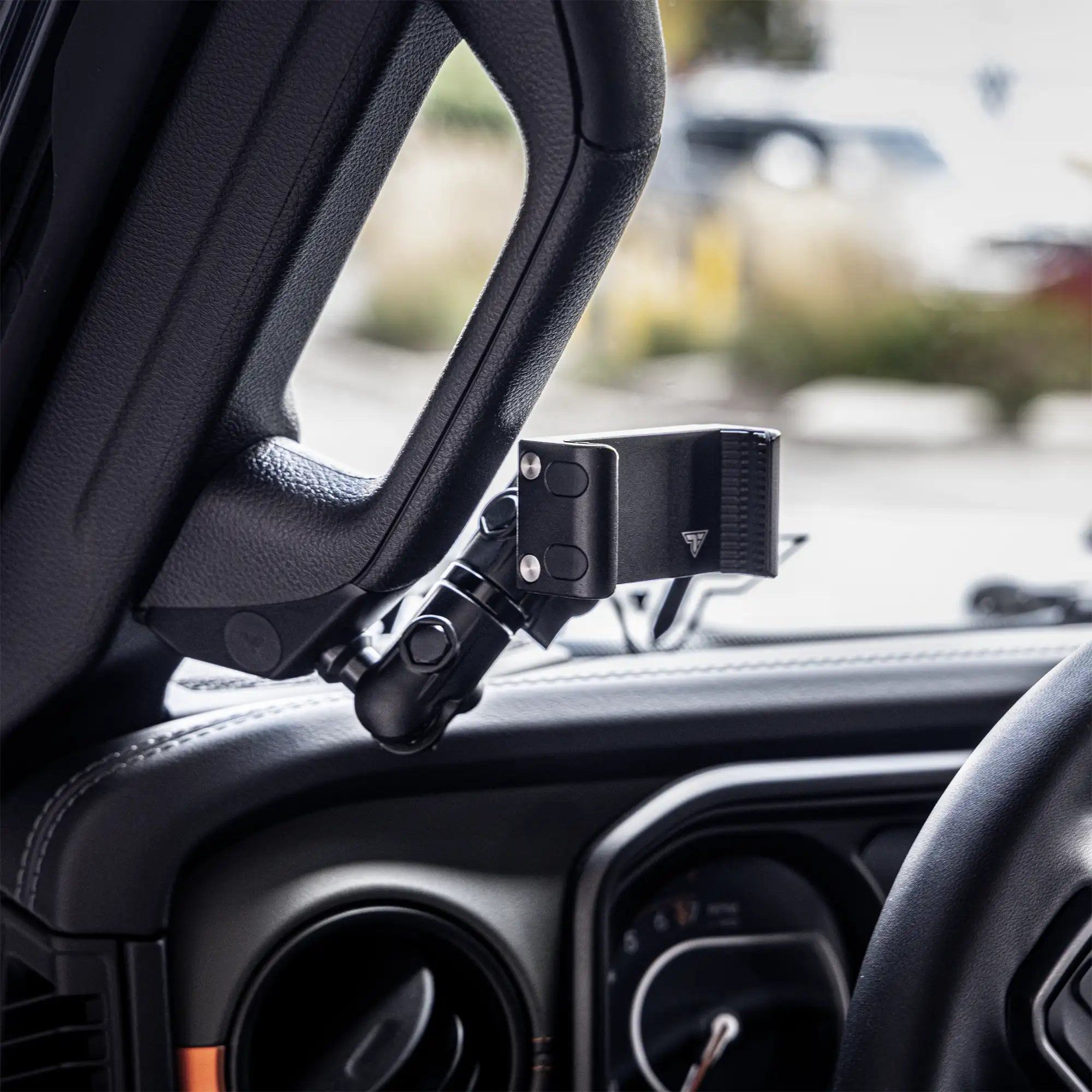 Lifestyle image of 2024+ Jeep JL, JT, 4xe Grab Handle Phone Mount