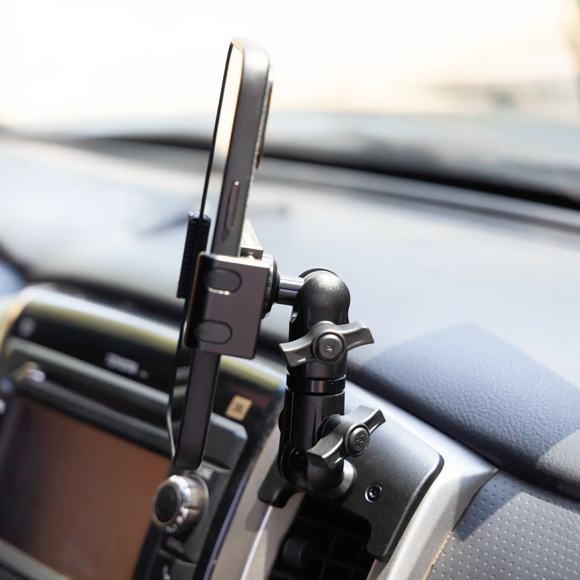 All-Metal Spring-Cradle Toyota Tacoma Phone Mount installed in the passenger side AC vent