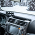 Lifestyle photo of 5th Gen 4Runner Phone Mount compatible with MagSafe for iPhone installed on the 4Runner dashboard with Tackform Assault Track Picatinny Dash Bracket