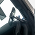 Ford Bronco phone mount with billet spring cradle installed in passenger side grab handle