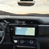 Spring cradle phone mount attached to an all-metal dash clip installed in a GMC Sierra