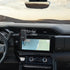 Wireless charging phone cradle attached to an all-metal dash clip installed in a GMC Sierra